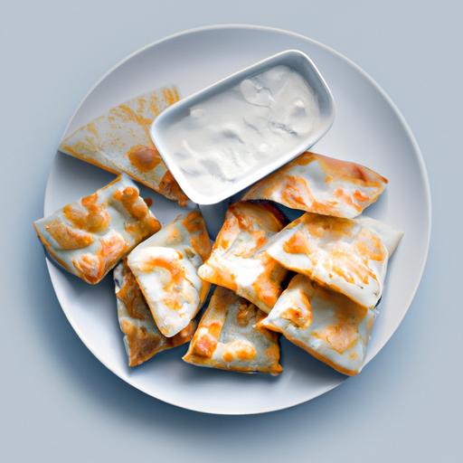Syrnikit kermavaahdon ja vadelmien kera